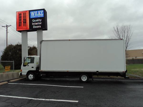 2004 White Isuzu Model Npr Hd Truck With Supreme 22 Cargo